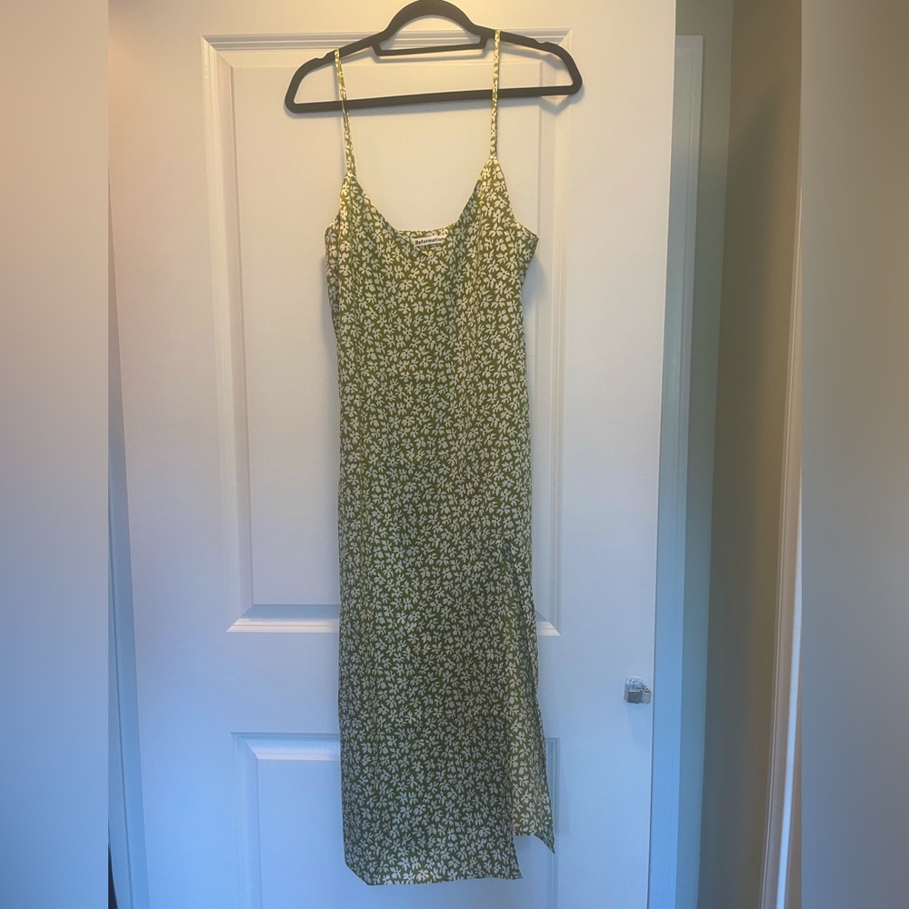 Green flowery Reformation midi dress with slit. Size large.